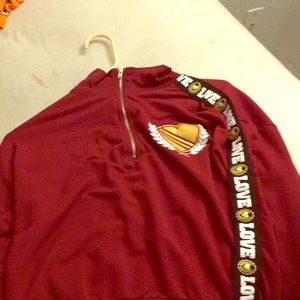 A mahogany zip down top